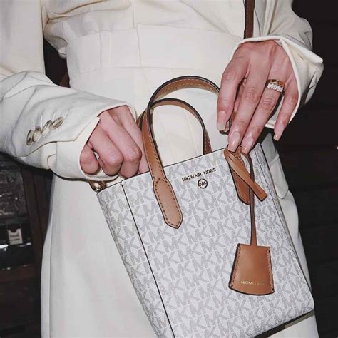 how to tell a genuine michael kors handbag|authentic michael kors handbags.